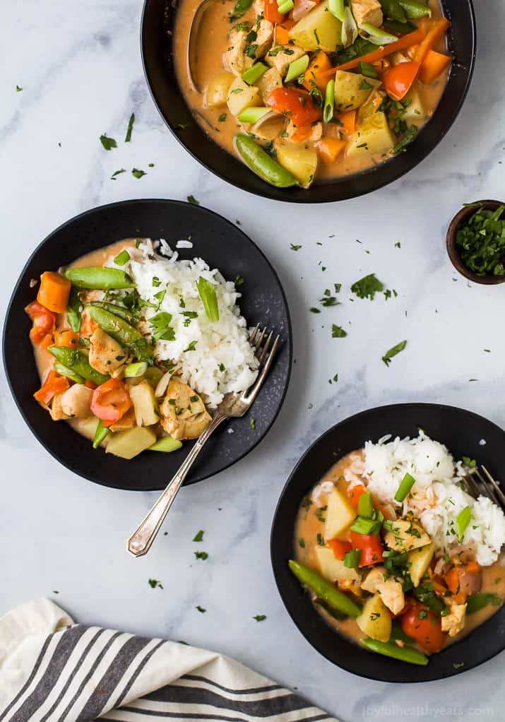 Top view of bowls of Crock Pot Chicken Curry with white rice