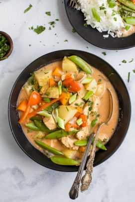 crock pot chicken curry in a bowl with rice