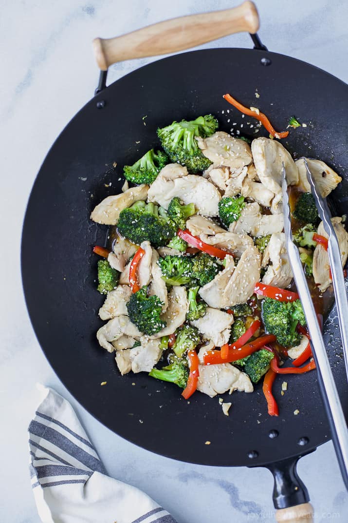 Top view of Chicken and Broccoli Stir Fry in a wok pan