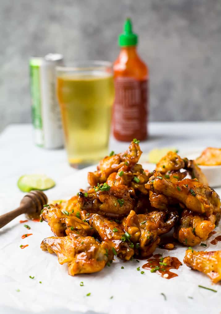 a pile of low carb honey sriracha baked chicken wings