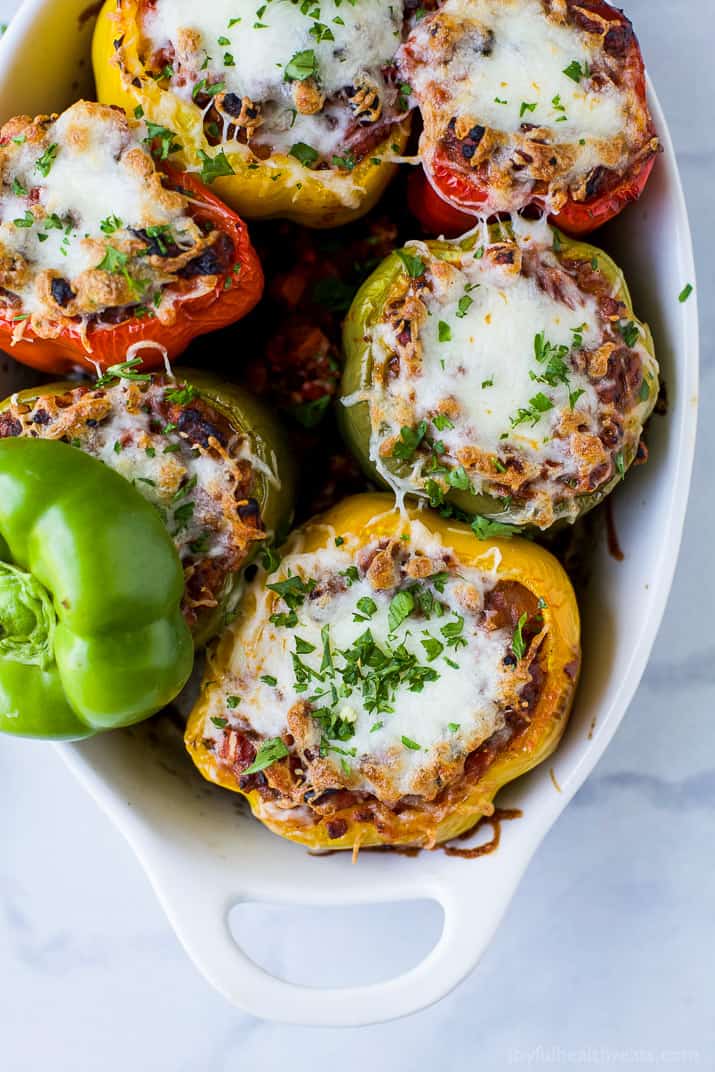 Gluten Free Turkey Bolognese Stuffed Peppers a simple dinner recipe filled with rich flavor your family will love. These Stuffed Peppers make the perfect comforting weeknight meal!