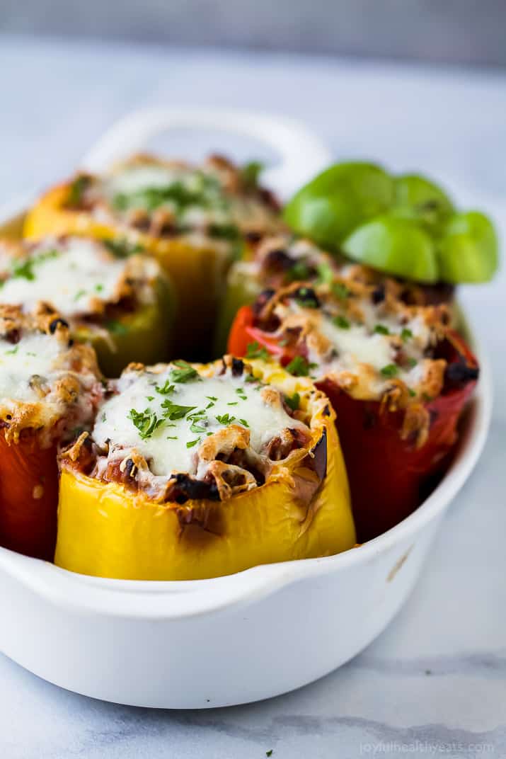 Gluten Free Turkey Bolognese Stuffed Peppers a simple dinner recipe filled with rich flavor your family will love. These Stuffed Peppers make the perfect comforting weeknight meal!