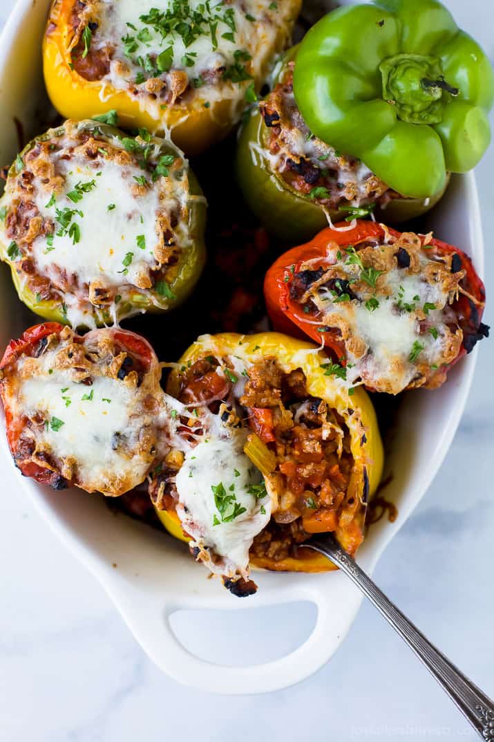 Gluten Free Turkey Bolognese Stuffed Peppers a simple dinner recipe filled with rich flavor your family will love. These Stuffed Peppers make the perfect comforting weeknight meal!