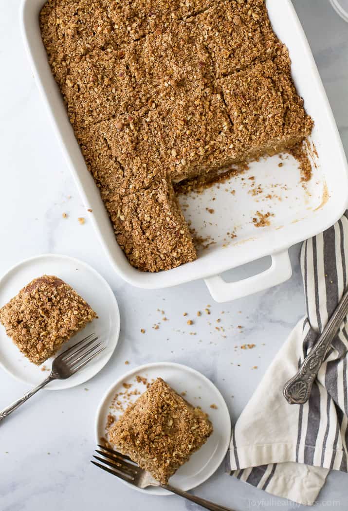 Top view of a pan of apple cinnamon coffee cake cut into squares