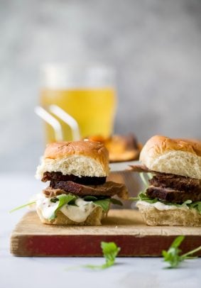 Beer Braised Slow Cooker Brisket Sliders tender moist brisket served on Hawaiian rolls then slathered with a creamy horseradish aioli. This easy flavorful appetizer is sure to be devoured as soon as it hits the table!