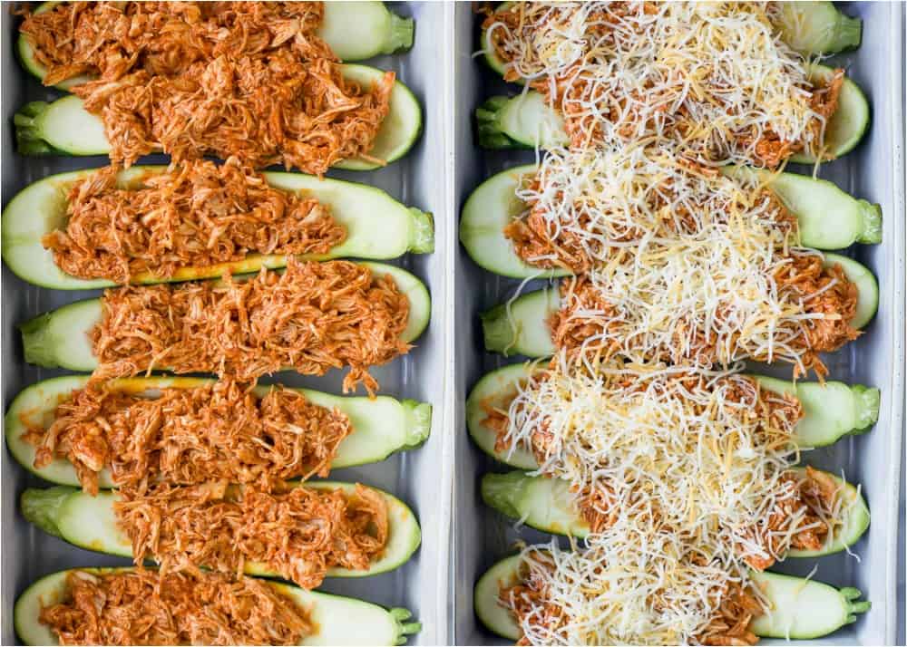 Chicken Enchilada Zucchini Boats in a pan before baking with and without cheese