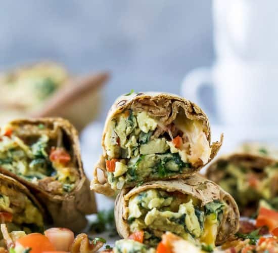 Freezer Bacon & Egg Breakfast Burritos an easy make a head breakfast that's in high protein and under 300 calories a serving. These Breakfast Burritos are a must if you're into meal prep!