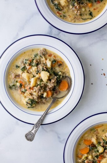 Instant Pot Zuppa Toscana Soup loaded with sausage, bacon, cauliflower and kale. This Zuppa Toscana recipe is low carb, dairy free, paleo and keto! It's an Olive Garden Copycat recipe that's guaranteed to be a hit!