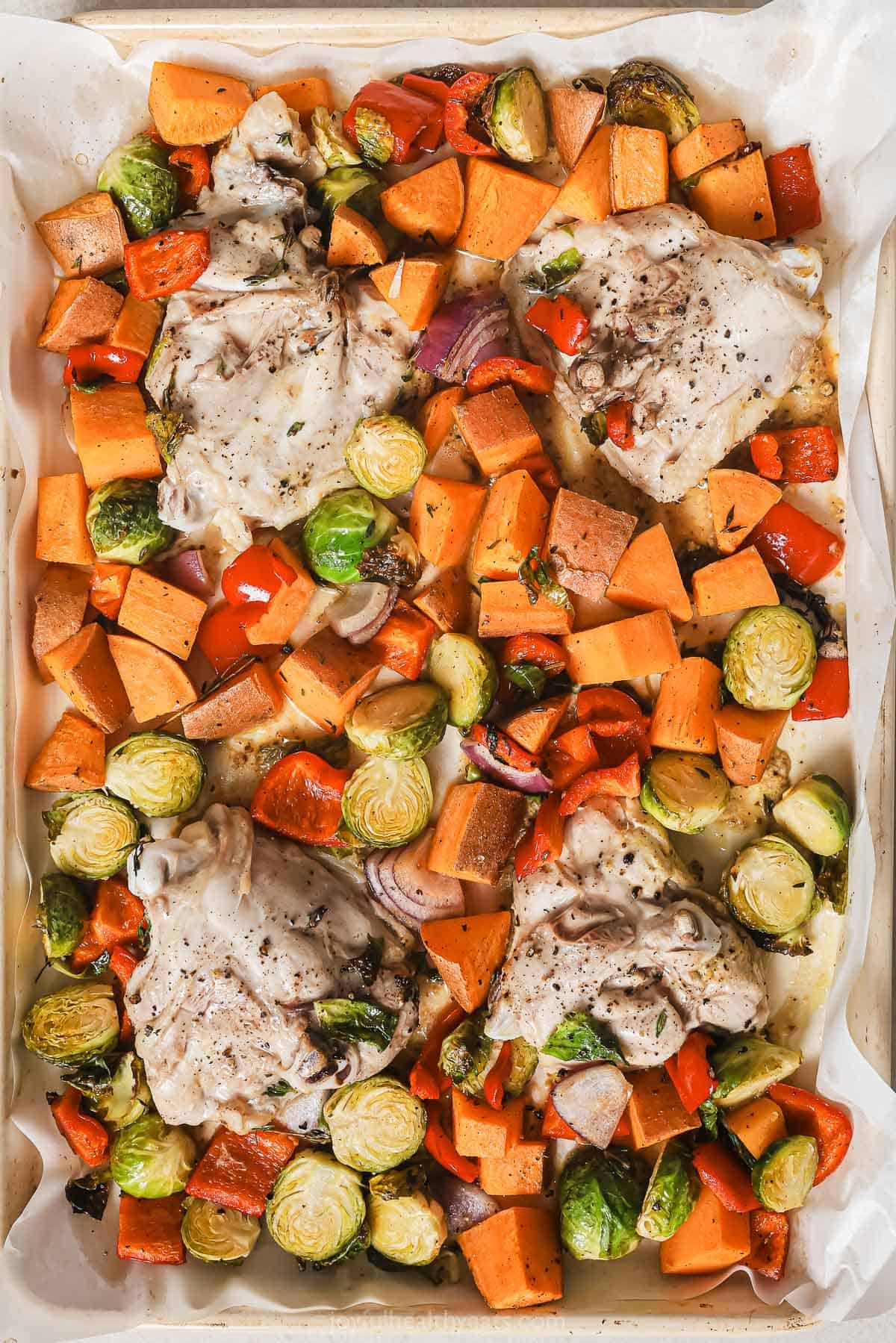 Baked chicken thighs and veggies. 