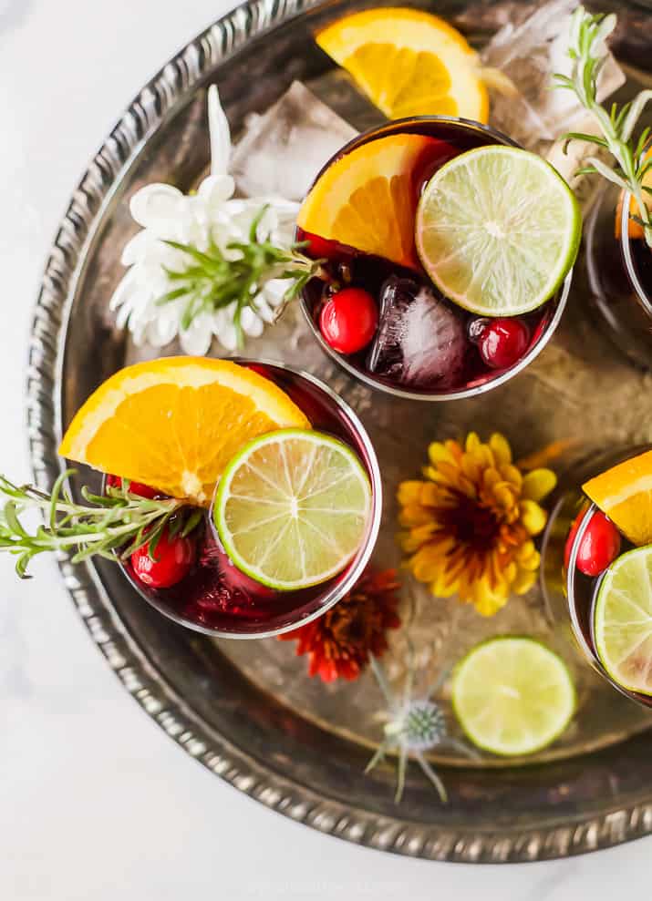 Top view of glasses of holiday cranberry sangria on a tray