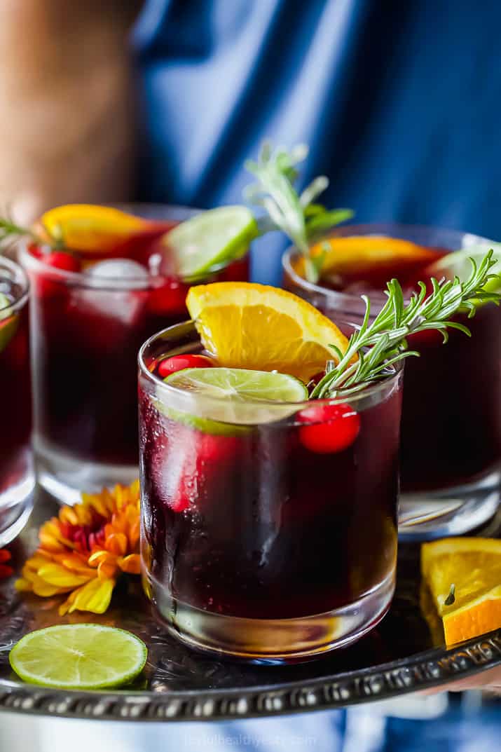 Glasses of holiday cranberry sangria on a serving tray
