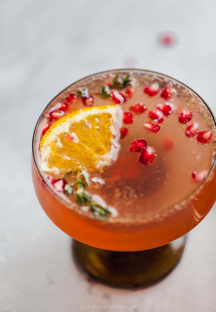 side view of holiday pomegranate gin cocktail