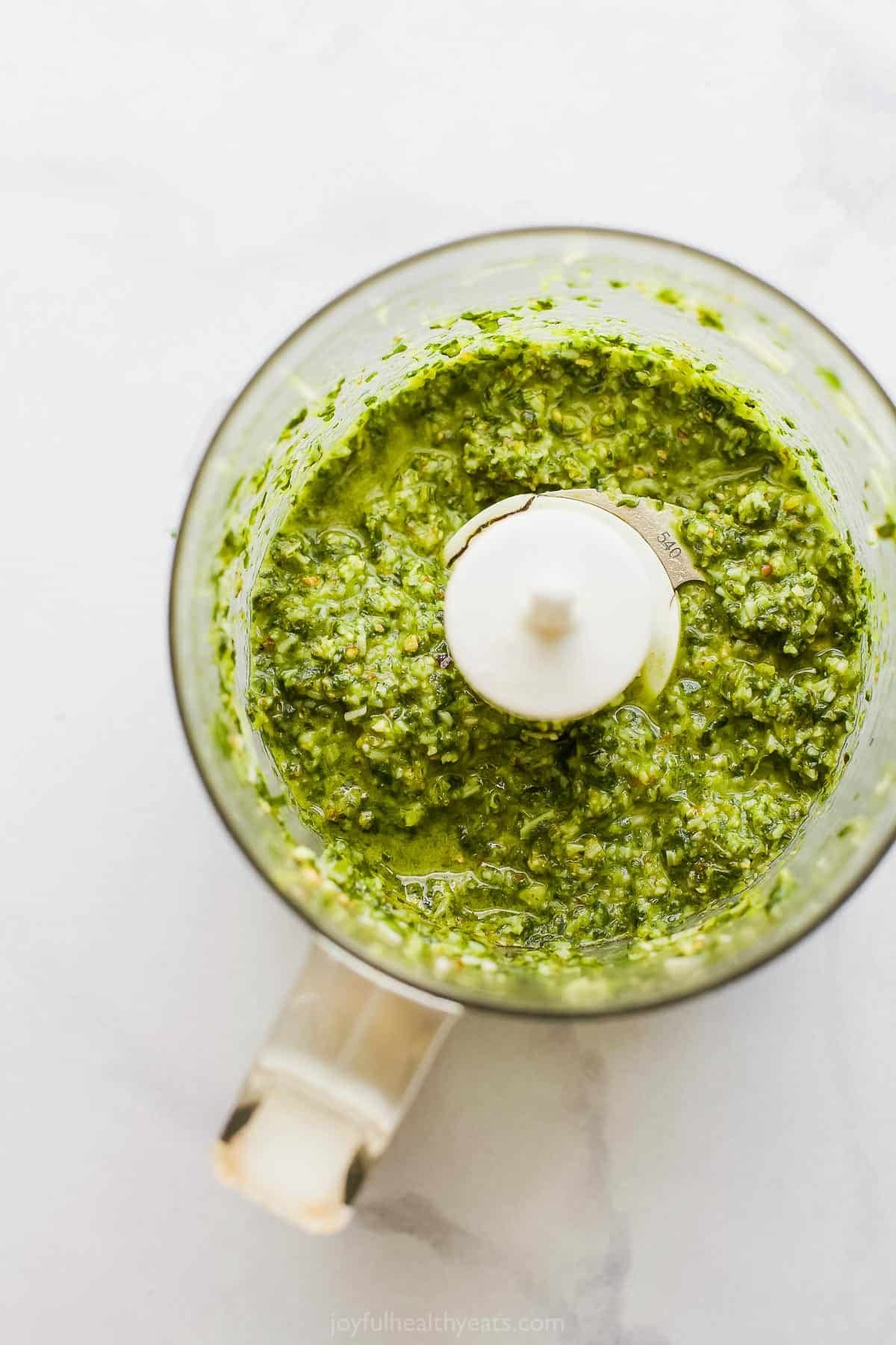 picture of basil pesto in a food processor