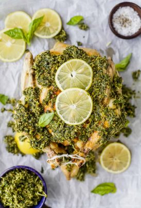 overhead picture of rotisserie chicken with pesto sauce