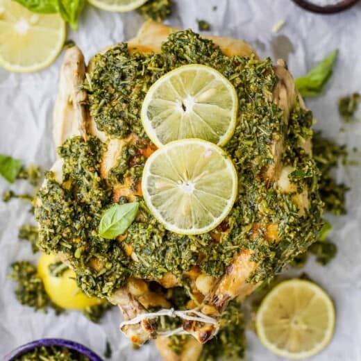 overhead picture of rotisserie chicken with pesto sauce