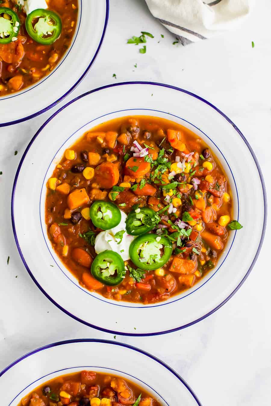 Two bowls of instant pot sweet potato black bean chili. 