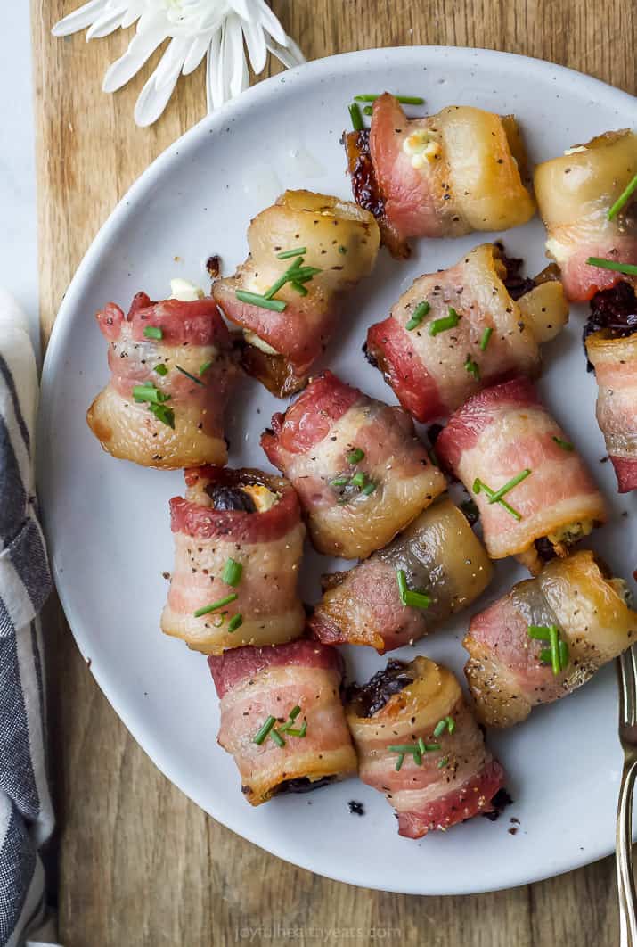 overhead photo of bacon wrapped figs with herb goat cheese