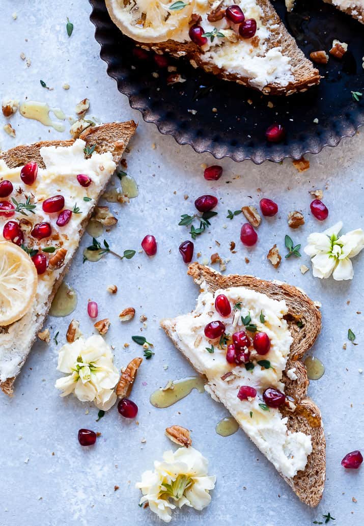 overhead photo of pomegranate honey ricotta toast