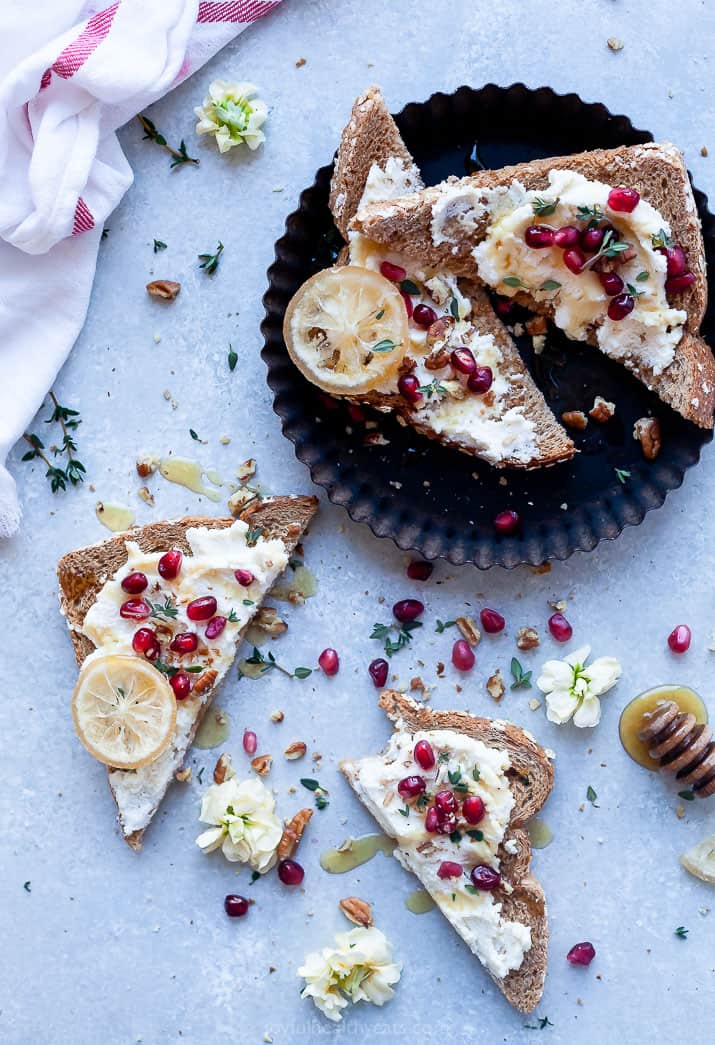 overhead photo of pomegranate honey ricotta toast