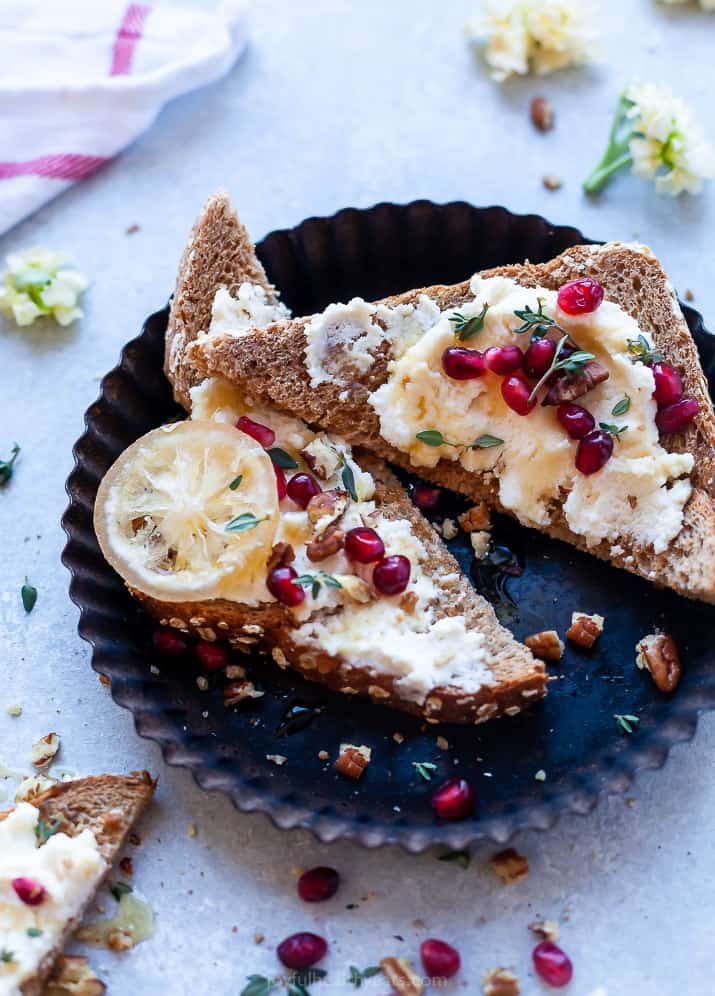 side view photo of pomegranate honey ricotta toast