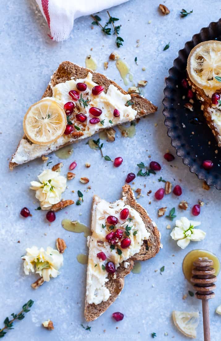 overhead photo of pomegranate honey ricotta toast