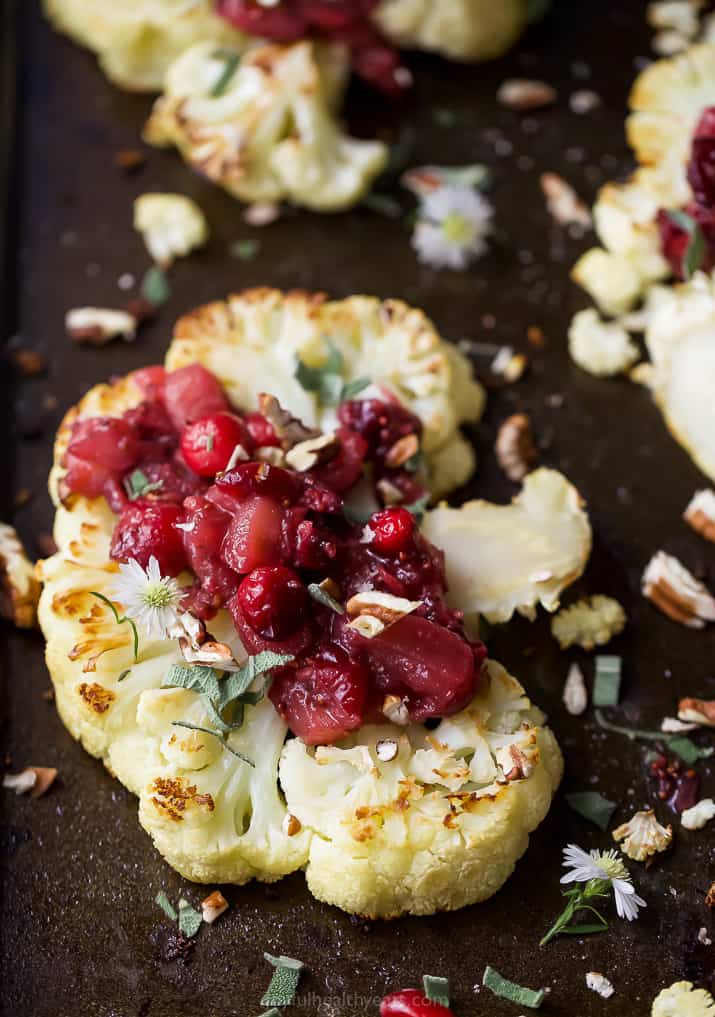 side photo of roasted cauliflower steaks with a cranberry apple chutney