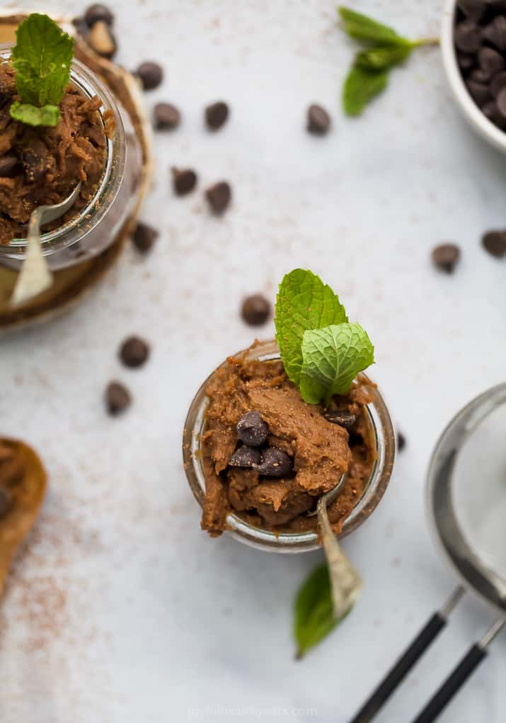 overhead photo of vegan thin min chickpea cookie dough in a jar