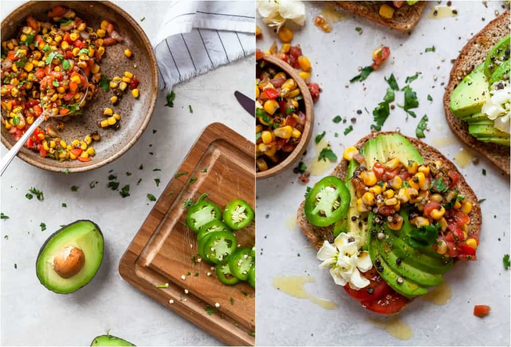 charred corn salsa in a bowl and a halved avocado next to a finished avocado toast topped with the corn salsa