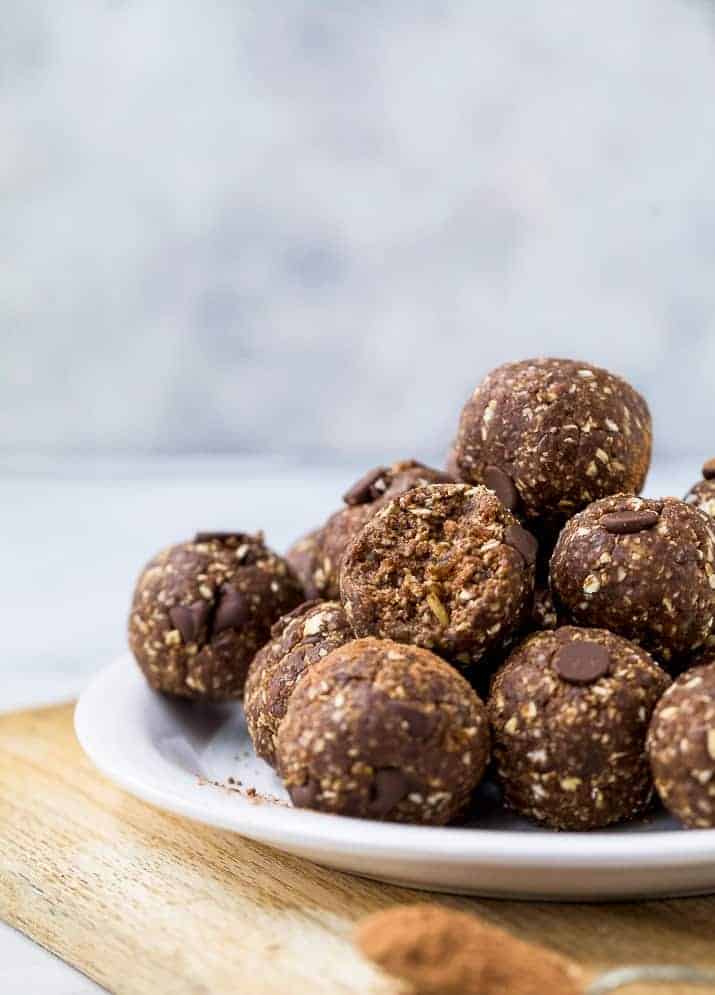 chocolate brownie energy balls piled on a plate