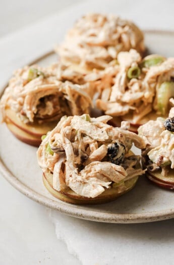 Cranberry chicken salad over sliced apples.