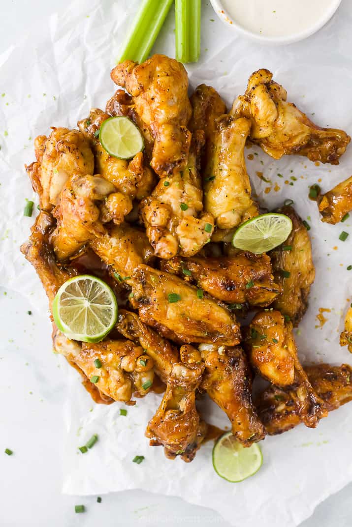 a pile of crispy baked chili lime chicken wings