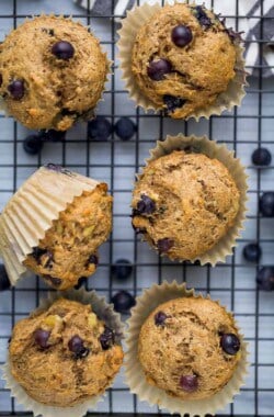banana blueberry muffins on a cooling rack
