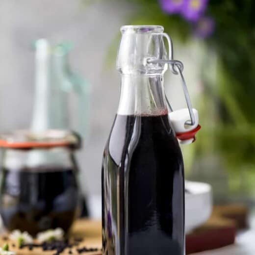 homemade elderberry syrup in a container