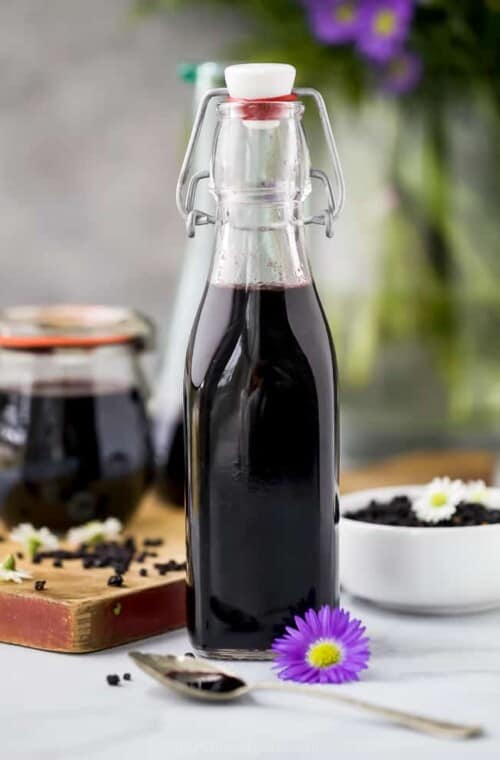 homemade elderberry syrup in a container