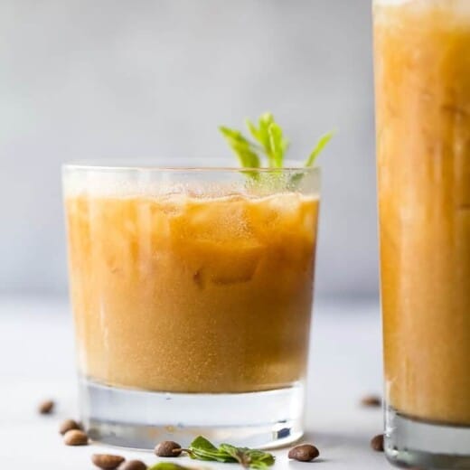 easy coconut milk thai iced coffee in a glass with mint