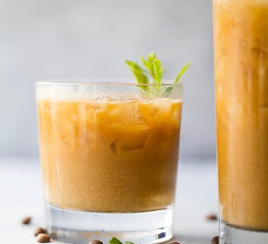 easy coconut milk thai iced coffee in a glass with mint