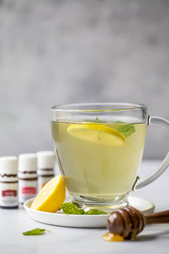 Wellness Thieves Tea in a cup with lemon 