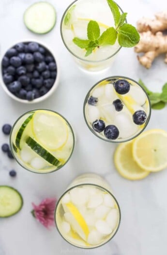 overhead photo of 4 detox lemon water recipes