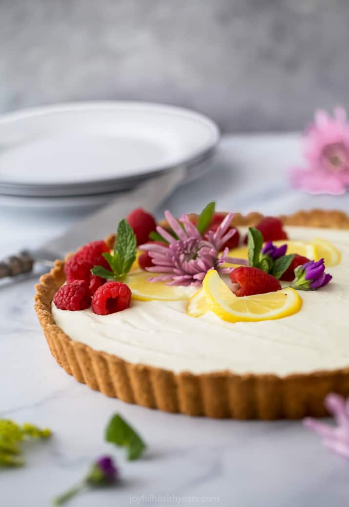 side angle of Creamy Lemon Tart Recipe with Almond Crust ready to be served