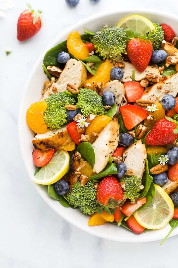 detox strawberry chicken salad with honey mustard dressing in a bowl