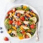 detox strawberry chicken salad with honey mustard dressing in a bowl