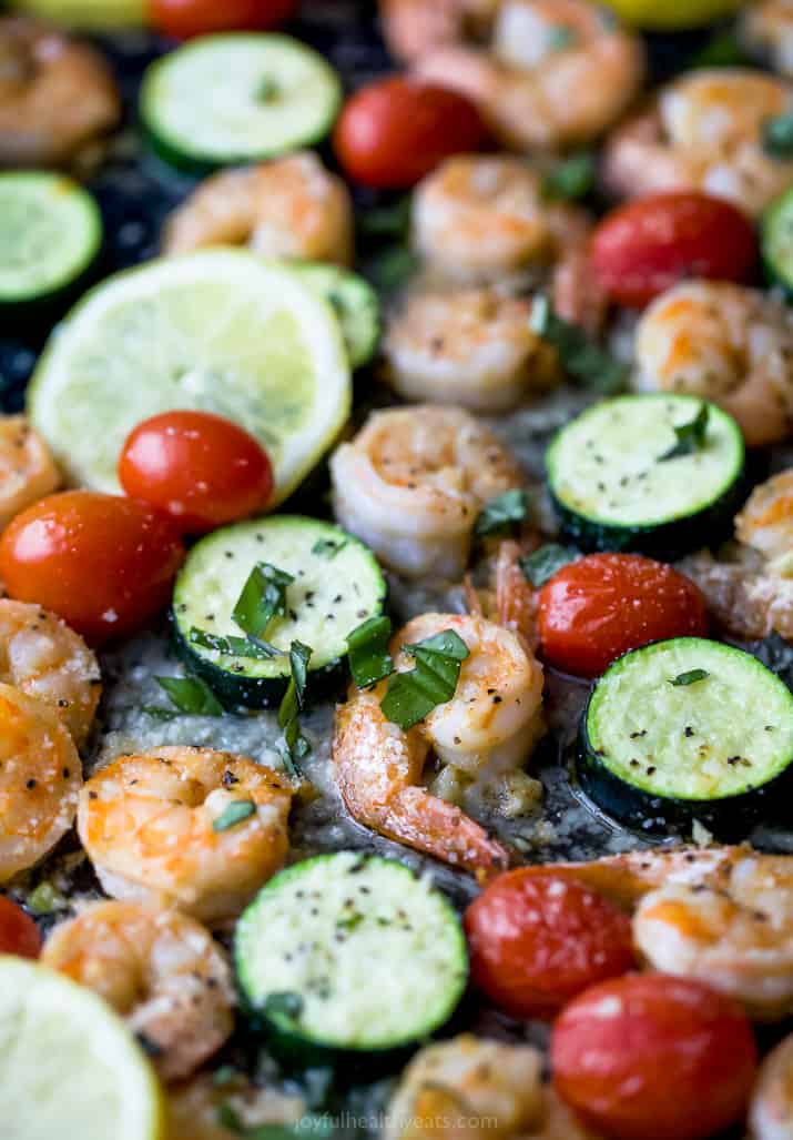 close up photo of Easy Garlic Parmesan Sheet Pan Shrimp and Zucchini on a pan