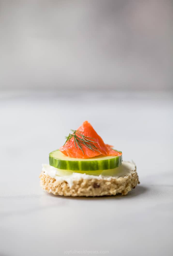 a single smoked salmon cucumber tea sandwiches