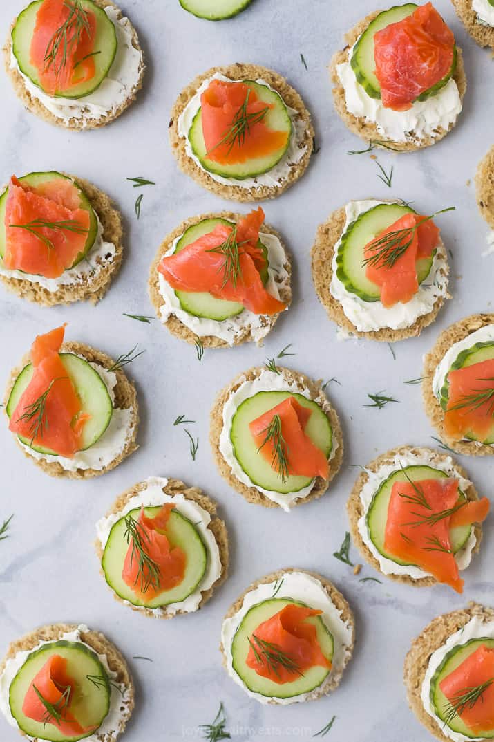 overhead photo of smoked salmon cucumber tea sandwiches