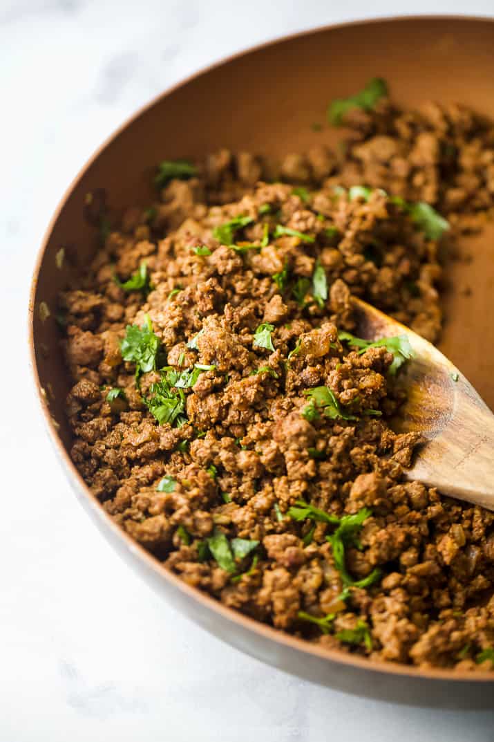 ground beef mixture for ground beef enchiladas in a pan