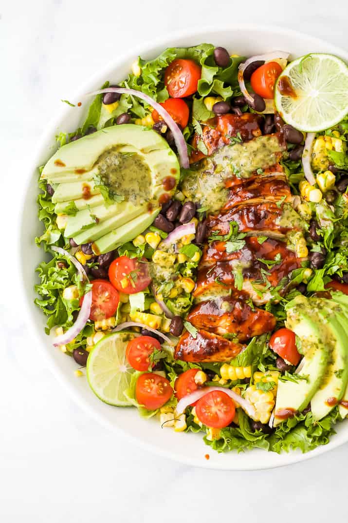 close up photo of 30 minute Grilled BBQ Chicken Salad with Cilantro Lime Dressing in a bowl 