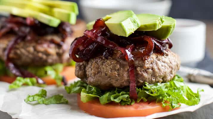 Close-up Image of a Paleo Burger with Caramelized Balsamic Onions