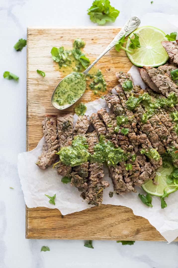 the best marinated grilled flank steak on a cutting board