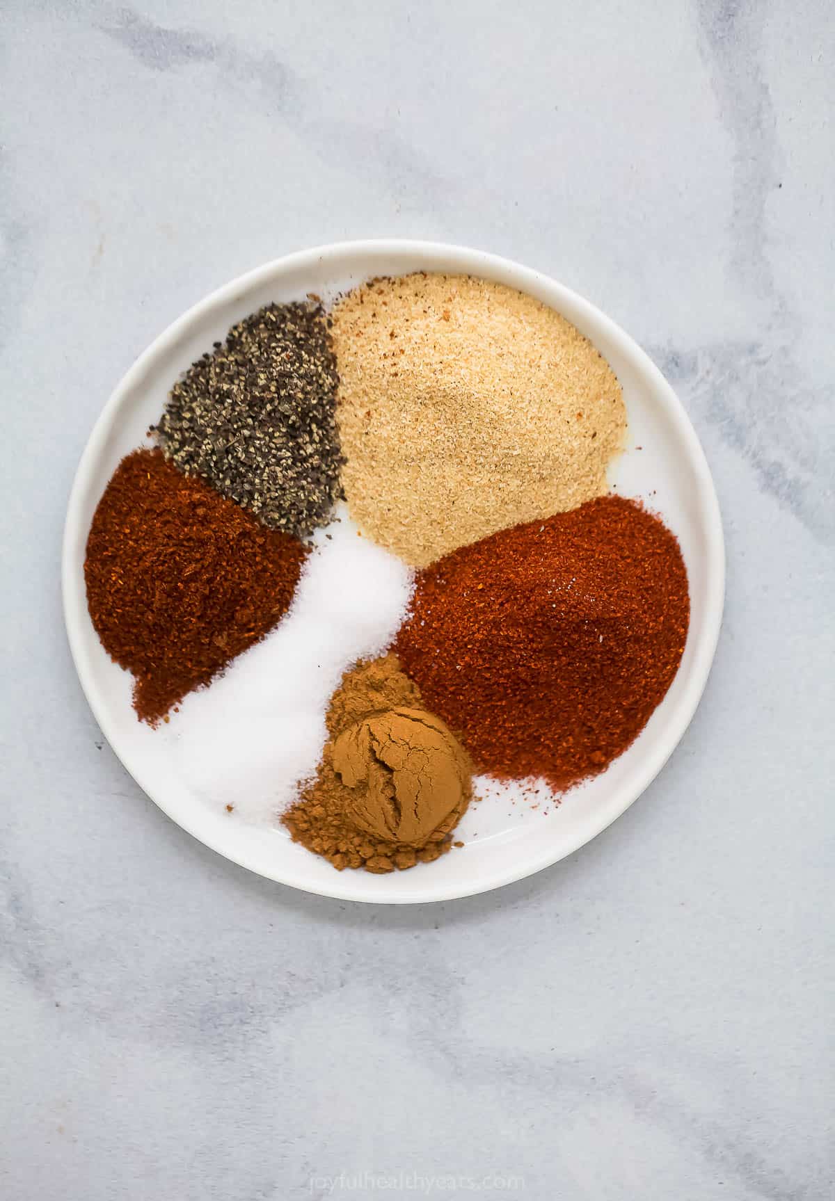 This fall-of-the-bone baby back rib recipe will be a favorite of July 4, with garlic-synamon spice rubs and BBQs Glass. Spices for ribs.