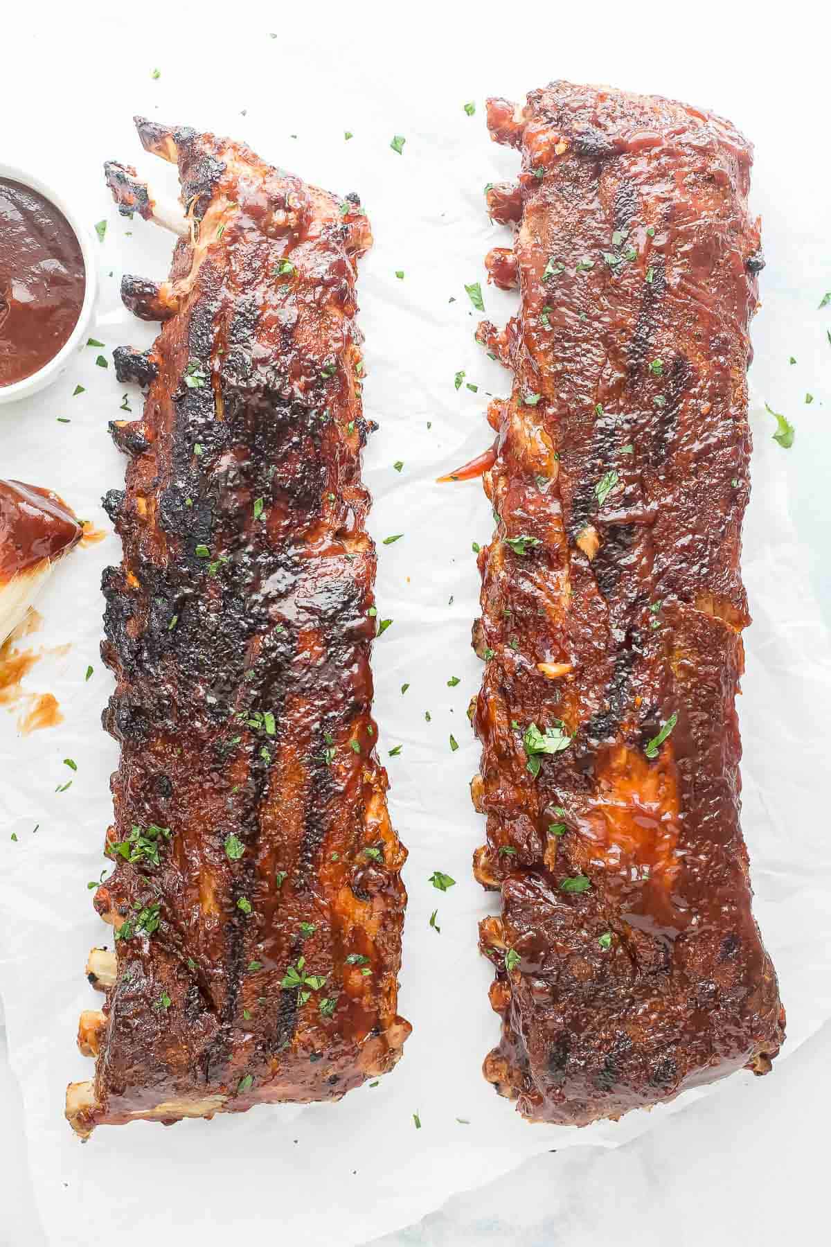 This fall-off-the-bone baby back rib recipe will be a favorite of July 4, with garlic-synamon spice rubs and BBQs Glass. Tender, two full racks of grilled ribs.